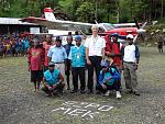 Me and some of my Papuan friends at Eipomek. I was flying the Kodiak that day. The strip is only 1200' long with an average of 7% slope.